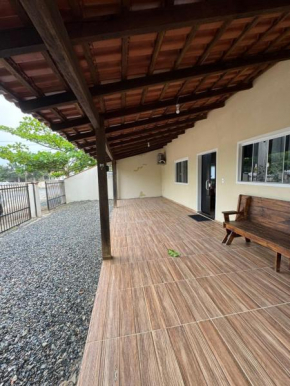5 quartos 2 suítes 400 MT da garagem da praia